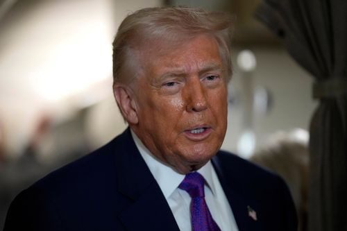 President Donald Trump speaks to reporters aboard Air Force One shortly before takeoff, Thursday, Feb. 19, 2026, at Joint Base Andrews, Md.