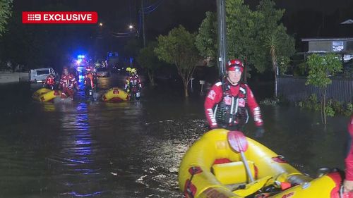Dozens rescued from floods as rain hammers Sydney
