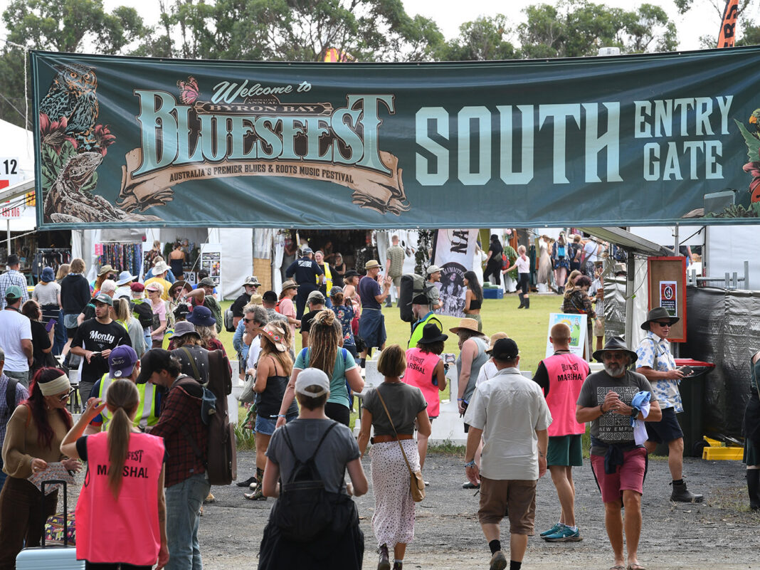 Festival visitors enter one of the main entrances during day one of the Byron Bay Bluesfest on April 14, 2022 in Byron Bay, Australia. The music festival returns after a two-year break due to the coronavirus pandemic. 