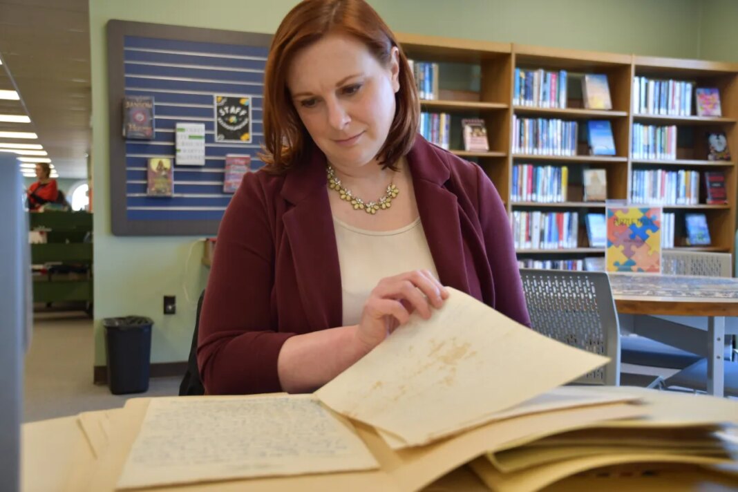 Archivist Kelley Sirko looks at love letters between a Black soldier and his wife during World War II that are part of a digital exhibit on Monday, Feb. 9, 2026 in Nashville, Tenn. (AP Photo/Kristin M. Hall)