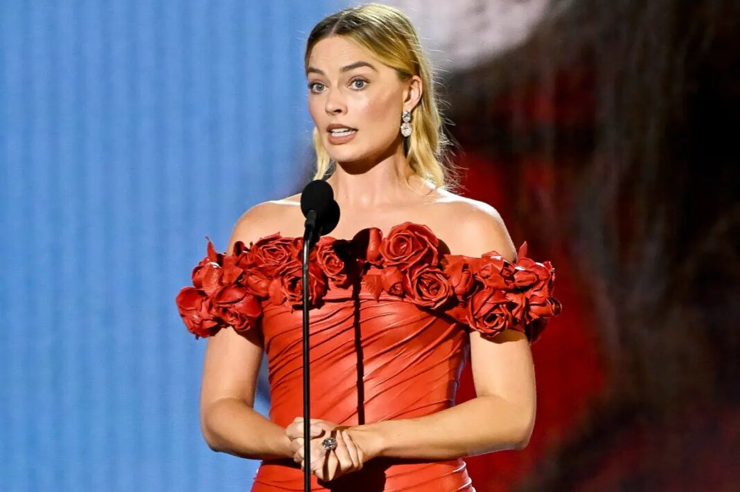 Margot Robbie says that a fellow actor once gave her a book telling her to eat less: ‘I was like, whoa’