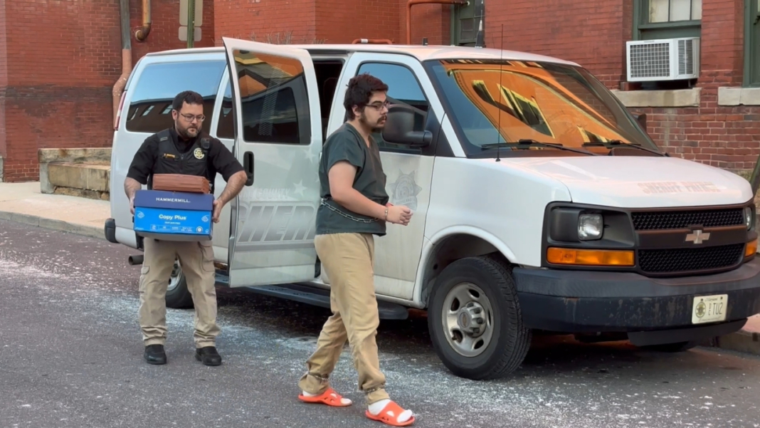 In this image taken from video, Daniel Blank, who is associated with a cultlike group known as Zizians that is linked to several deaths across the U.S., is escorted into court for a pretrial hearing on trespassing, gun and drug charges in Cumberland, Md., Friday, Jan. 16, 2026. (AP Photo/Mark Scolforo)