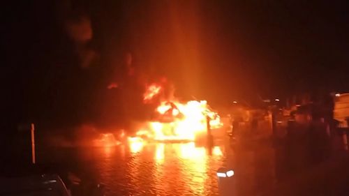Mystery blast burns boats and forces restaurant to evacuate