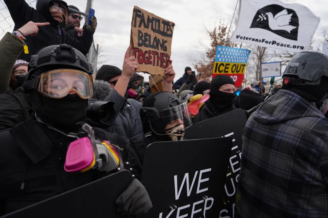 Counterprotesters demonstrate against Jake Lang on Saturday, Feb. 7, 2026, in Minneapolis. (AP Photo/Ryan Murphy)