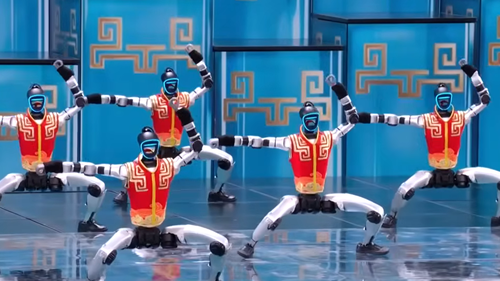 The robots at the Chinese New Year Gala performed alongside several child performers in a routine lasting almost five minutes.