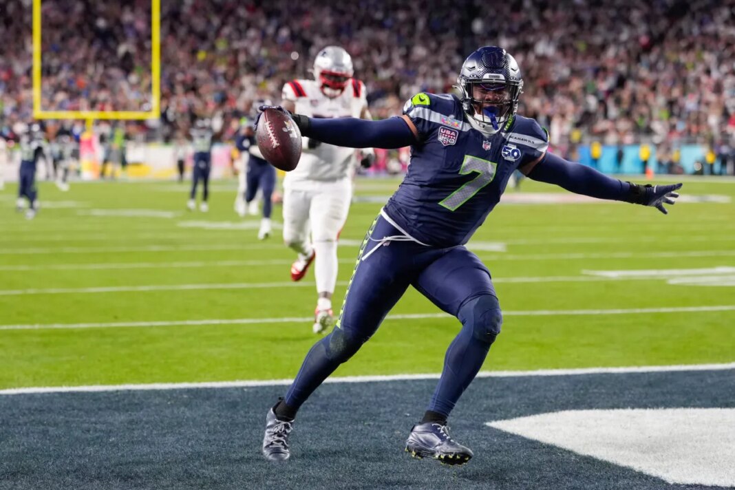 Seattle Seahawks linebacker Uchenna Nwosu (7) celebrates his touchdown on a fumble recovery during the second half of the NFL Super Bowl 60 football game against the New England Patriots, Sunday, Feb. 8, 2026, in Santa Clara, Calif. (AP Photo/Mark J. Terrill)