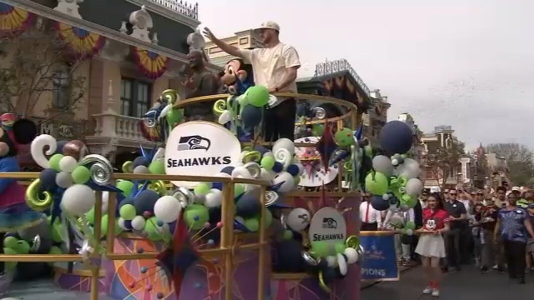 Seattle Seahawks Sam Darnold, Kenneth Walker III celebrate Super Bowl victory at Disneyland