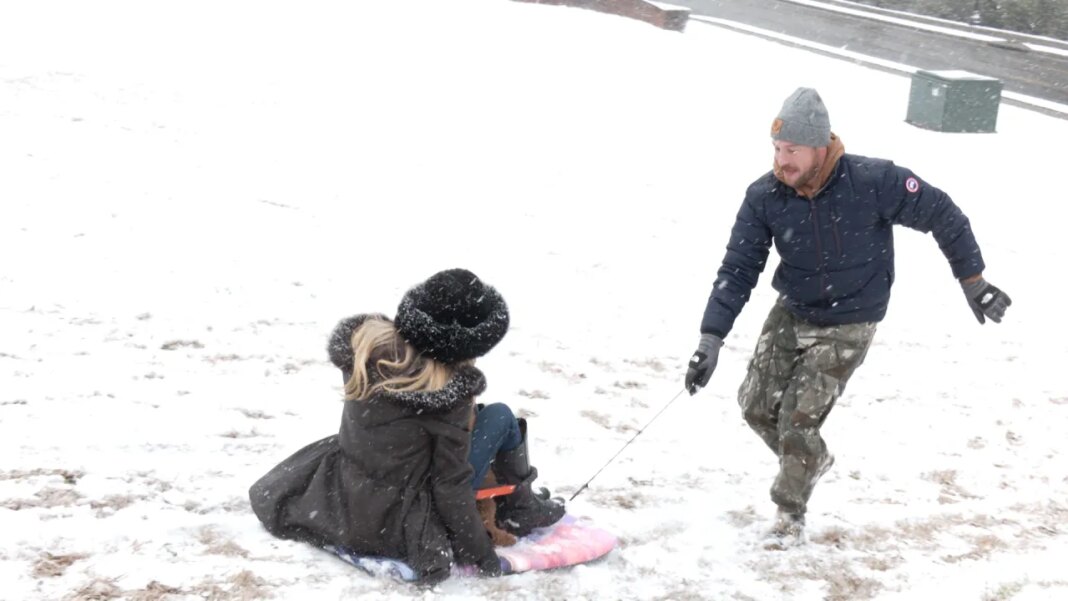 Sledders take to Berckman's Road during snow day