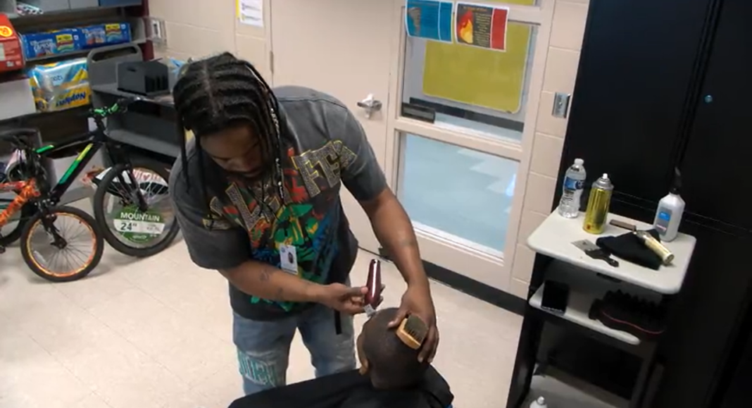 Supporting students with haircuts, sparking conversations in Champaign