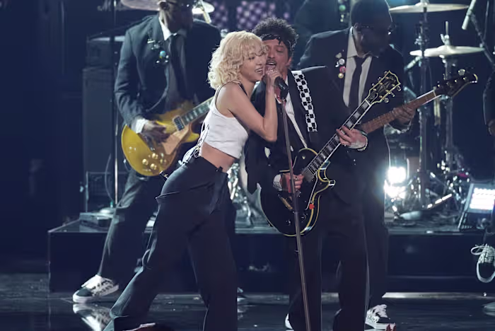 The Grammys had lots of Mars, Carpenter soaring and a near-naked Bieber. Here are some key moments