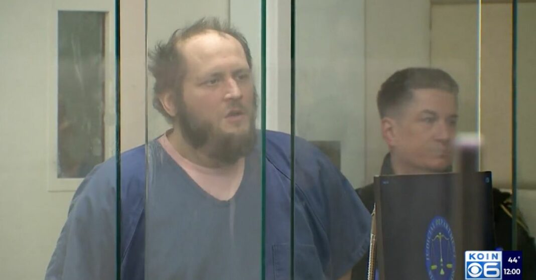 'Trump's coming': Man accused of pulling gun from tote bag and shooting 2 cops claims president will rescue him from 'unconstitutional and illegal insurrection'