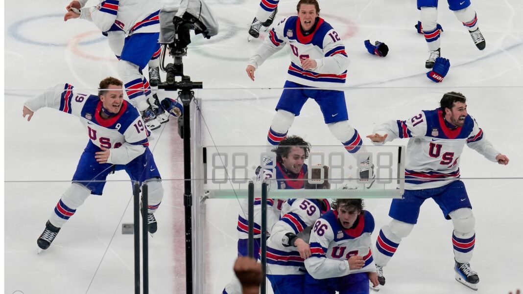 US beats Canada 2-1 in overtime to win first men's hockey championship at the Olympics since 1980
