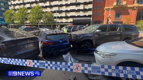 U﻿ndercover police have rammed a car in the middle of Melbourne after it was seen driving erratically.