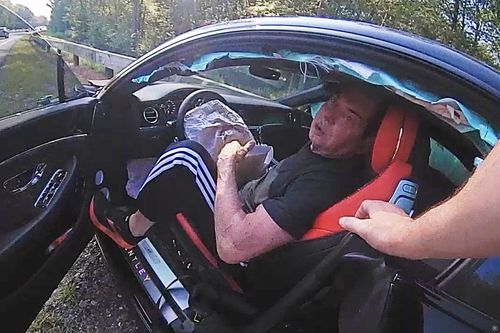 In an image taken from Connecticut State Police police bodycam video, Vince McMahon is questioned in his car after an accident on July 24, 2025, in Westport, Ct.  