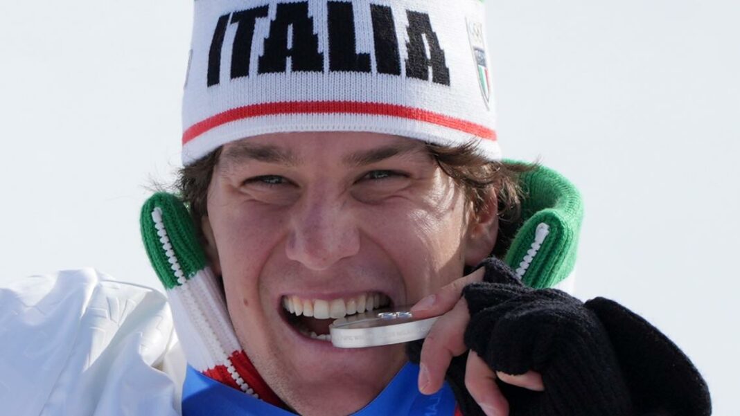 Why do Olympic athletes bite their medals?