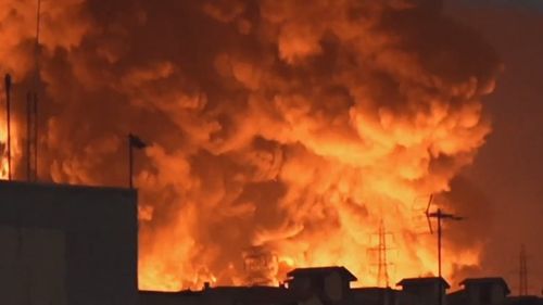 Tehran's night sky lit up as the city's oil refineries were hit.