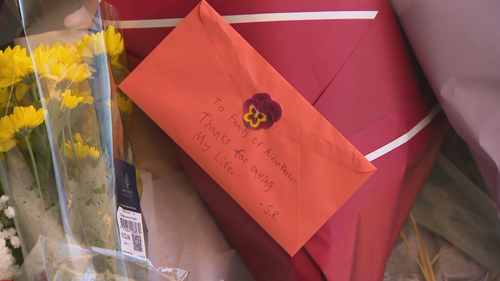 The boy who was allegedly being robbed when Aidan Becker stepped in left a heartfelt note at the scene of the alleged attack.