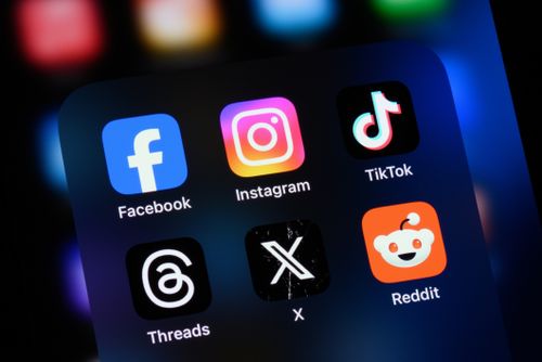 Toronto, Canada - August 22, 2024:    Popular social media apps on an Apple iPhone: Facebook, Instagram, TikTok, Threads, X (formerly Twitter), and Reddit.