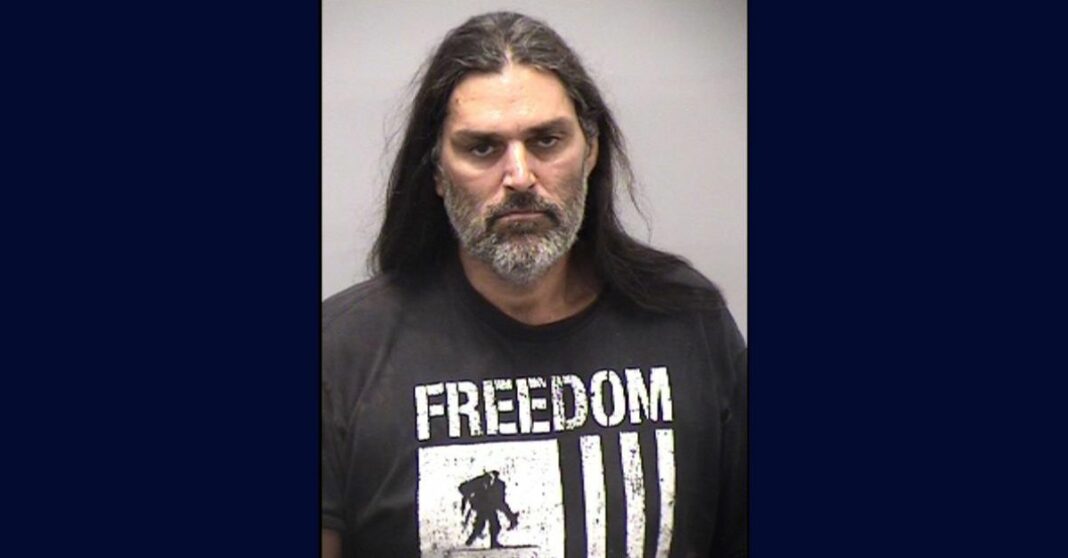 'A human skull': Agitated man charged with murder after 'talking about a cremation' leads to burned 'skeletal remains' being found on his property, authorities say