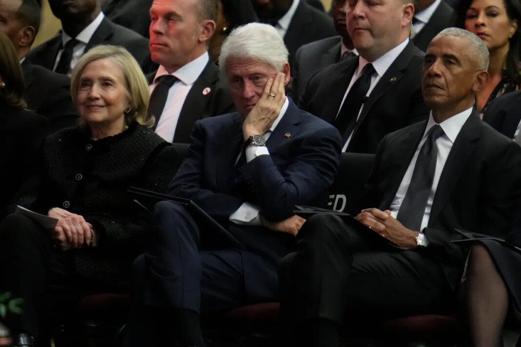 Former Secretary of State Hillary Clinton, former President Bill Clinton and former President Barack Obama attend the Public Homegoing Service for Reverend Jesse Jackson at the House of Hope in Chicago, Friday, March 6, 2026. (AP Photo/Erin Hooley)
