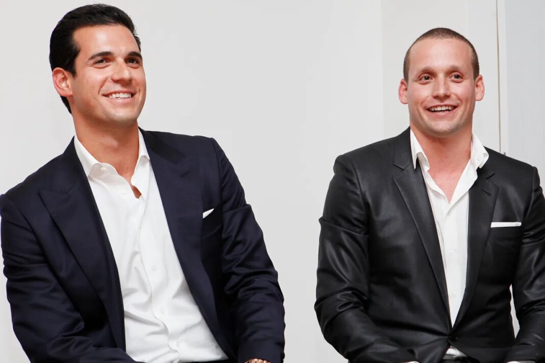 FILE - Oren and Tal Alexander speak at a panel at the Rockstars of Real Estate Event in New York., on Sept. 3, 2013. (Photo by Amy Sussman/Invision for DETAILS Magazine/AP Images, File)