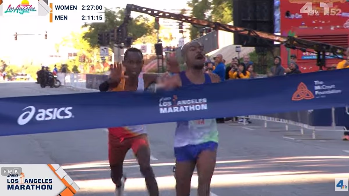 American runner sprints past rival on the line to win LA Marathon