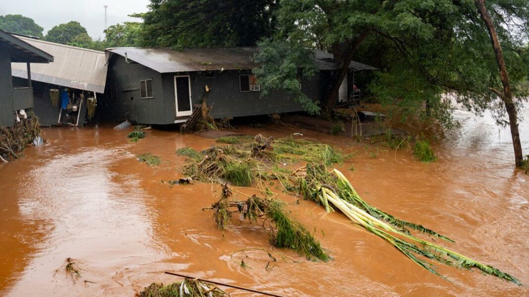 Dozens rescued as flooding hits Hawaii, with officials warning a 120-year-old dam could fail