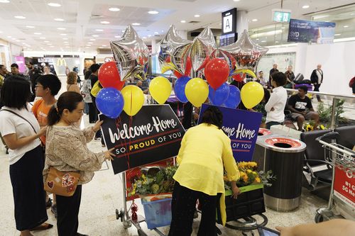 First planeload of Australians stranded in Dubai lands in Sydney