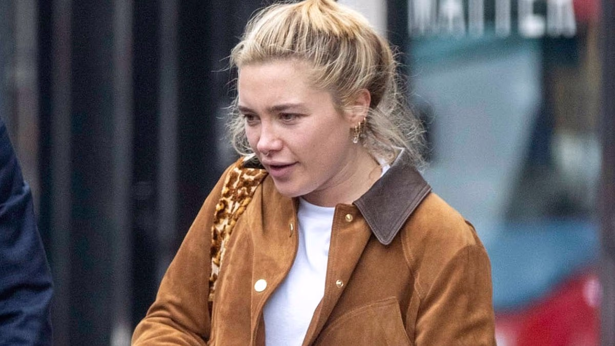 Florence Pugh leaves boutique gym in west London with beloved pet dog
