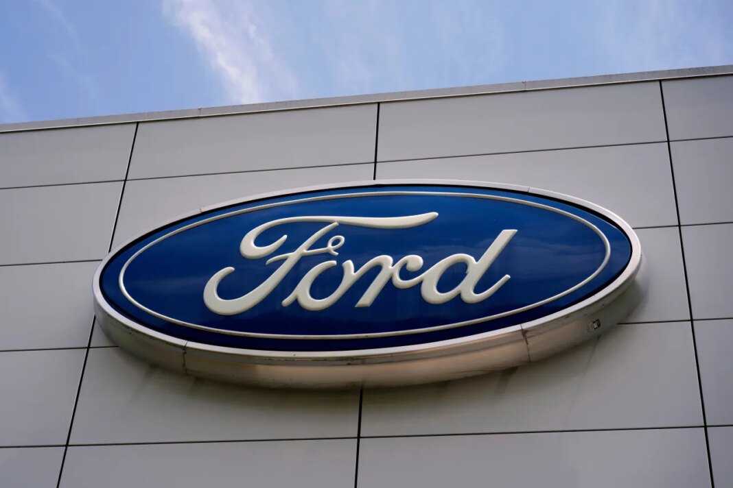 FILE - The Ford logo is displayed above the entrance to the Ford Motor Company Kentucky Truck Plant, Wednesday, April 30, 2025, in Louisville, Ky. (AP Photo/Carolyn Kaster, File)