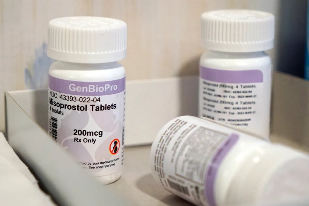 FILE - Bottles of the drug misoprostol sit on a table at the West Alabama Women