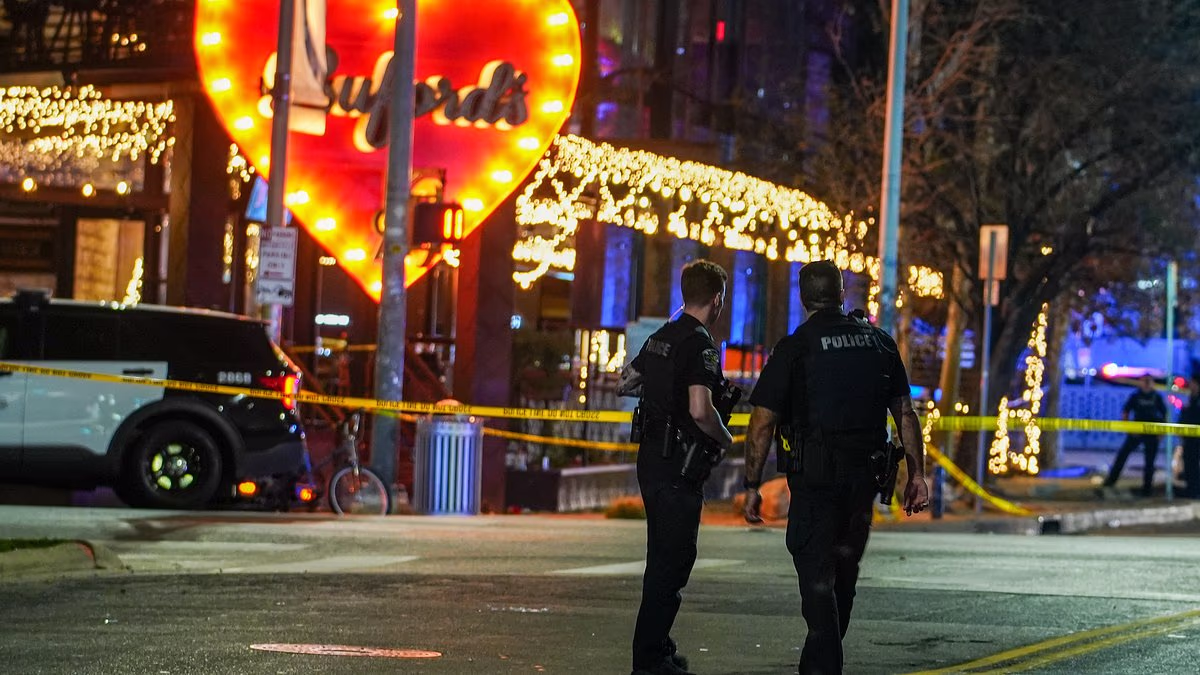 Gunman who shot two dead had 'photos of Iranian leaders' in home