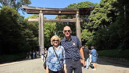 Lorraine and Howard Williams, pictured sightseeing in Japan during their cruise.