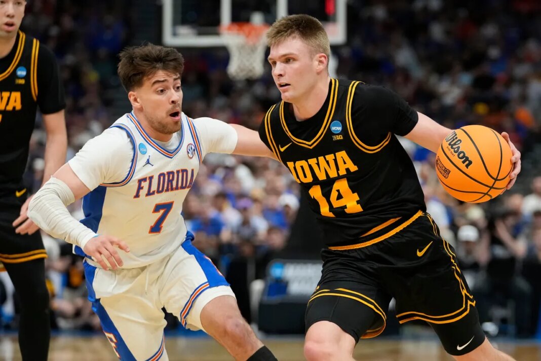 Iowa beats No. 1 seed and defending champ Florida in March Madness on Folgueiras’ 3 in final seconds