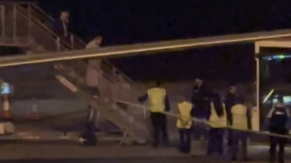 Iranian women's soccer team flies out of Australia - but more choose to stay as claim emerges of players' families taken hostage in their home country