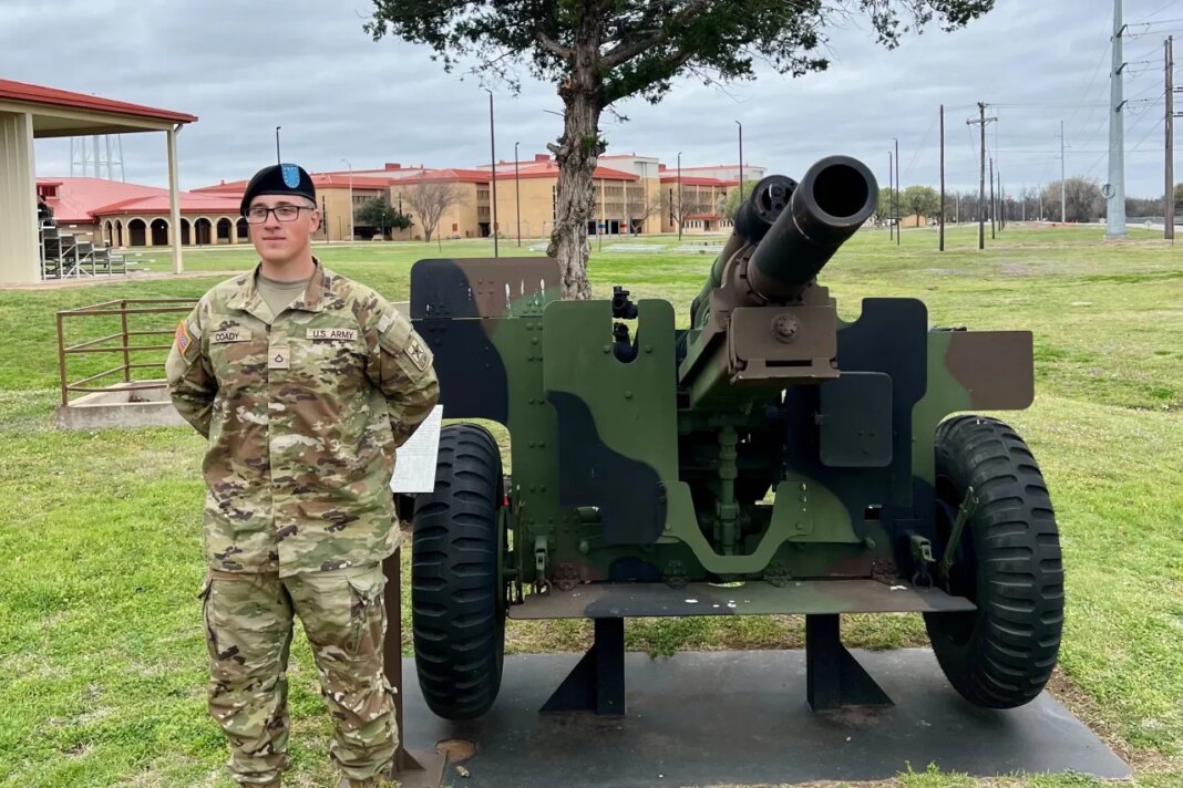 This photo provided by Andrew Coady shows his son, Declan Coady, posing for a photo on the day of his graduation at U.S. Army Training Center at Fort Sill, Okla., March 15, 2024. (Andrew Coady via AP)