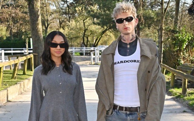 MACHINE GUN KELLY ATTENDS PARIS FASHION WEEK WITH DAUGHTER CASIE COLSON BAKER