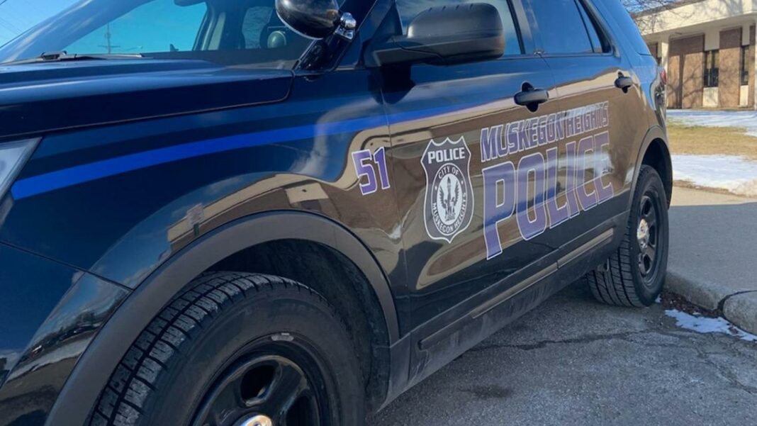 Michigan woman who squeezed out of police car window while in handcuffs is back in custody