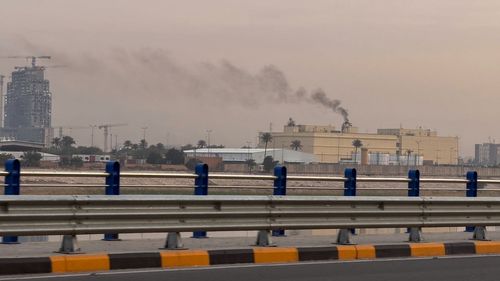 A missile struck a helipad inside the US Embassy in Baghdad, two security officials said.