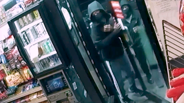 gif of four men walking through door