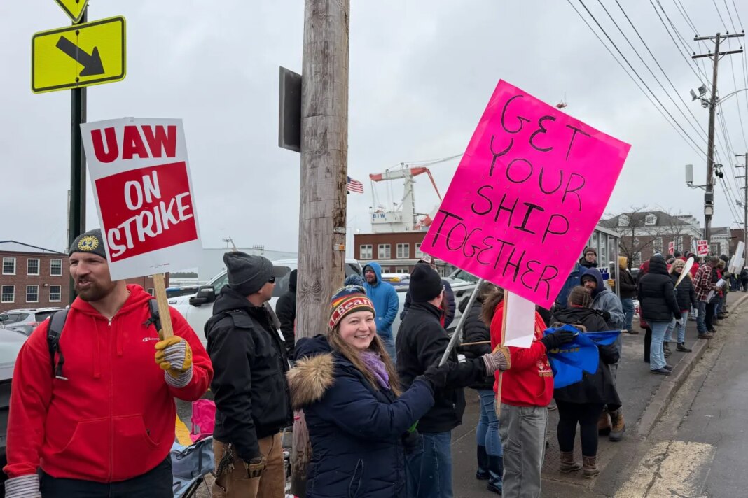 FILE - Striking workers stage picket line outside Bath Iron Works in Bath, Maine, on Monday, May 23, 2026. (AP Photo/Rodrique Ngowi, File)