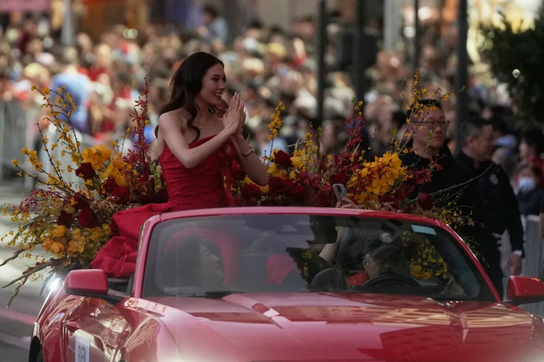 Olympic gold medalist and Grand Marhsal Eileen Gu gestures during the Chinese New Year Parade in San Francisco, Saturday, March 7, 2026. (AP Photo/Jeff Chiu)