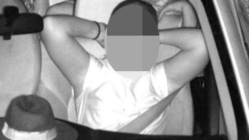 Nick's daughter momentarily slipped her seatbelt below her shoulder to do up her ponytail.