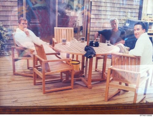 This undated photo released by the U.S. Department of Justice, shows Jeffrey Epstein, center, sitting with Andrew Mountbatten-Windsor and Peter Mandelson. (U.S. Department of Justice via AP)