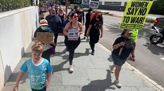 Protesters rally, march in downtown Tampa for International Women’s Day