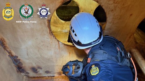 Police uncover one of the hiding places on the ship.