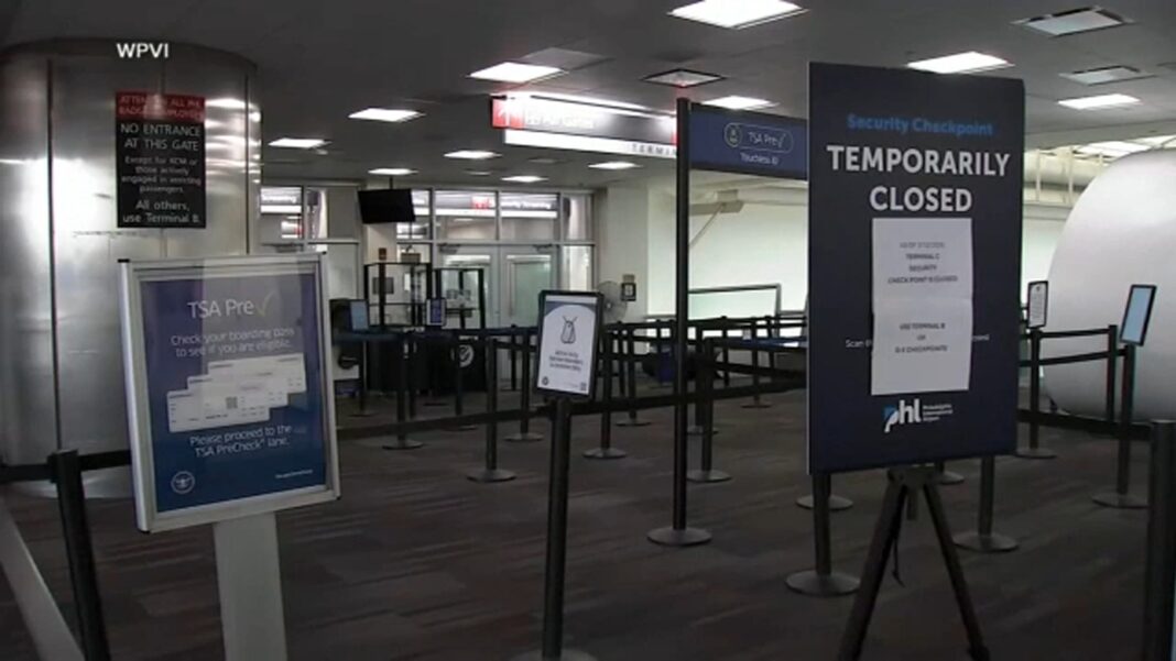 TSA workers face reality of working without pay as passengers unaware of the shutdown see long lines