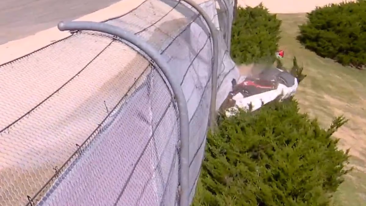 Terrifying moment IndyCar star cheats death after smashing through barriers in scary 170mph crash on live TV