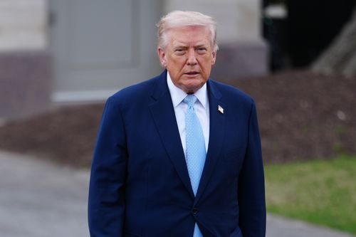 President Donald Trump walks to speak with reporters before departing on Marine One from the South Lawn of the White House, Friday, March 20, 2026, in Washington. (AP Photo/Julia Demaree Nikhinson)