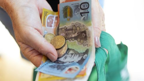 GEN23, Generic, cash payments, shopping, cost of living,  wages, withdrawal, atm, armaguard, groceries, in Sydney on April 1, 2024. 